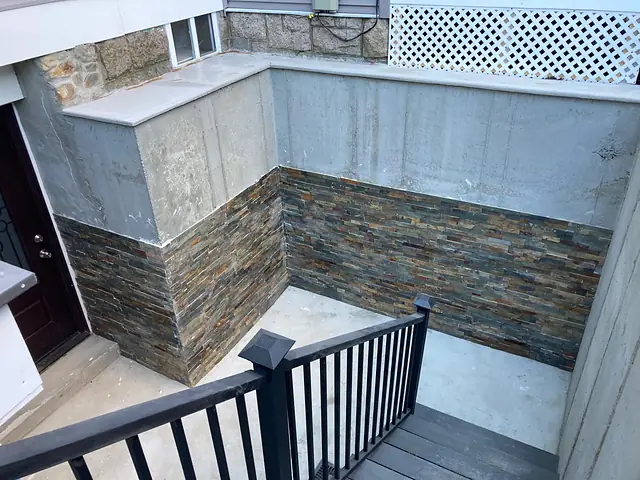 Stone veneer stairwell