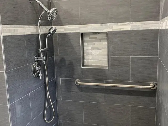 Walk-in shower with grab bar