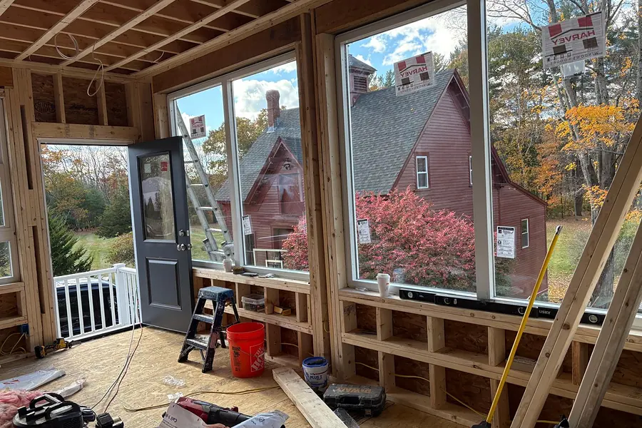 Home addition framed with new large windows